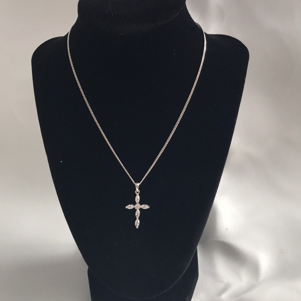 NWT Claire’s clear gem cross necklace.